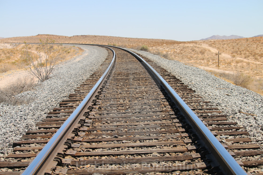 "Train tracks curving" stock image