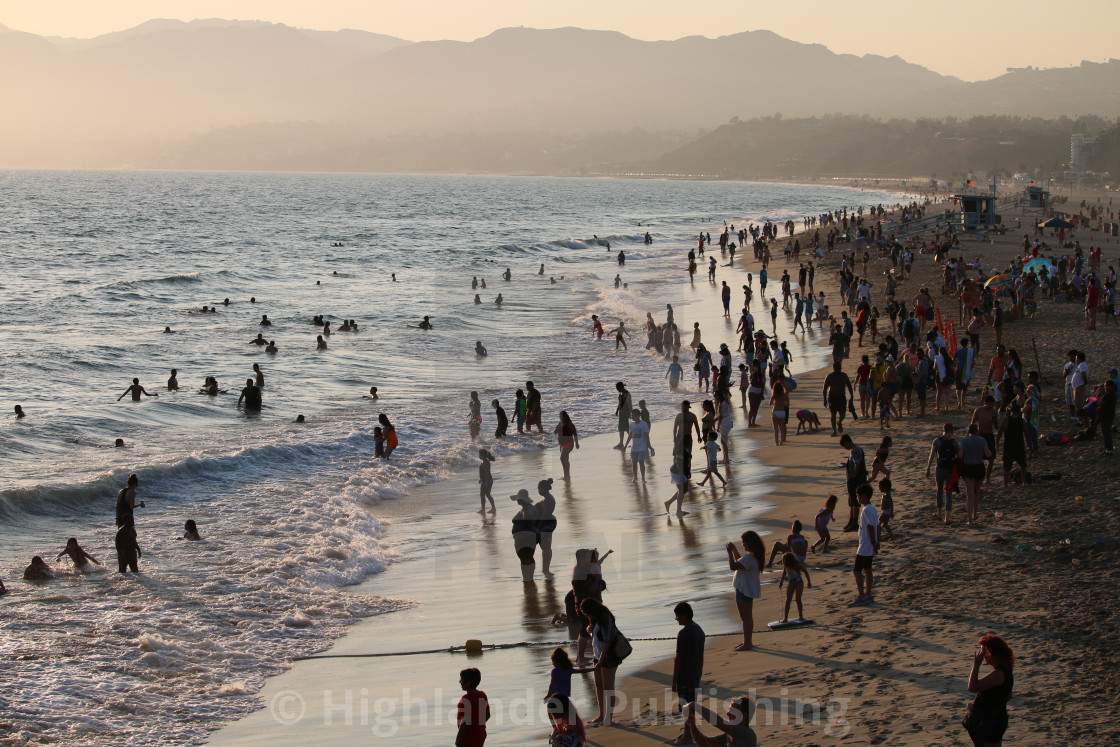 "California Beach Crowded at Sunset" stock image