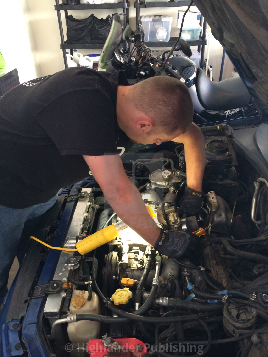 "Mechanic Fixing Car" stock image