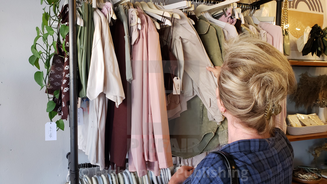 "Woman shopping for clothes" stock image