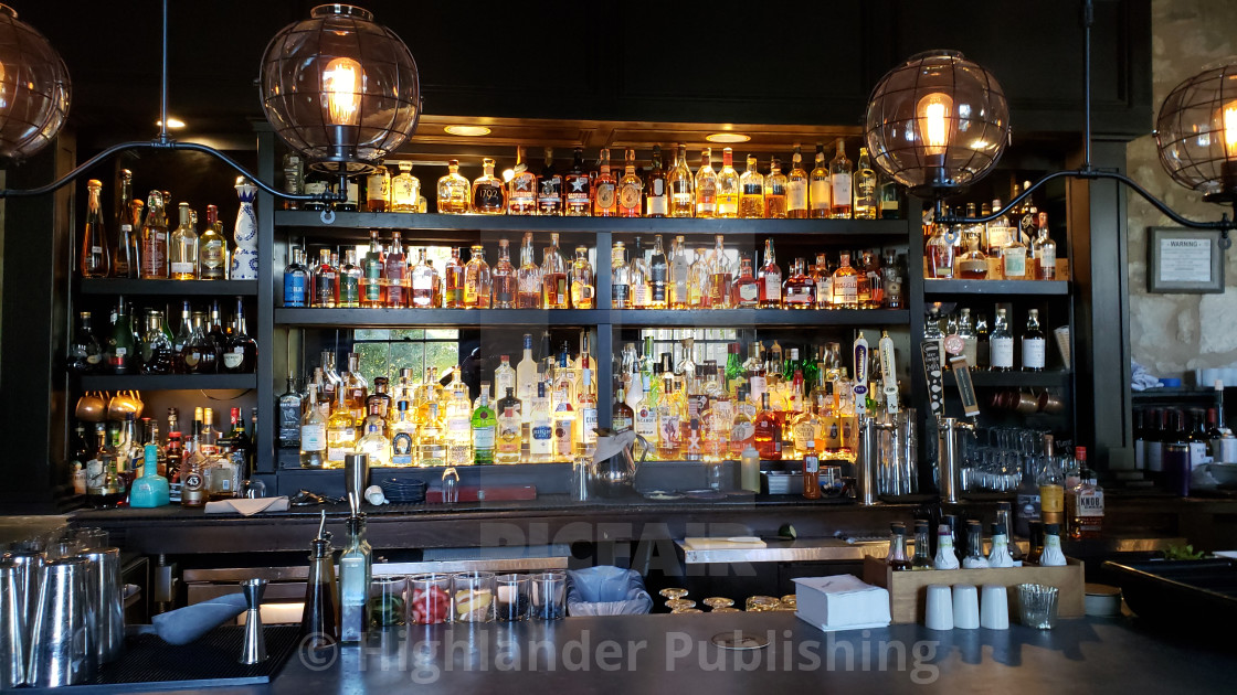 "Bar backdrop with bottles" stock image