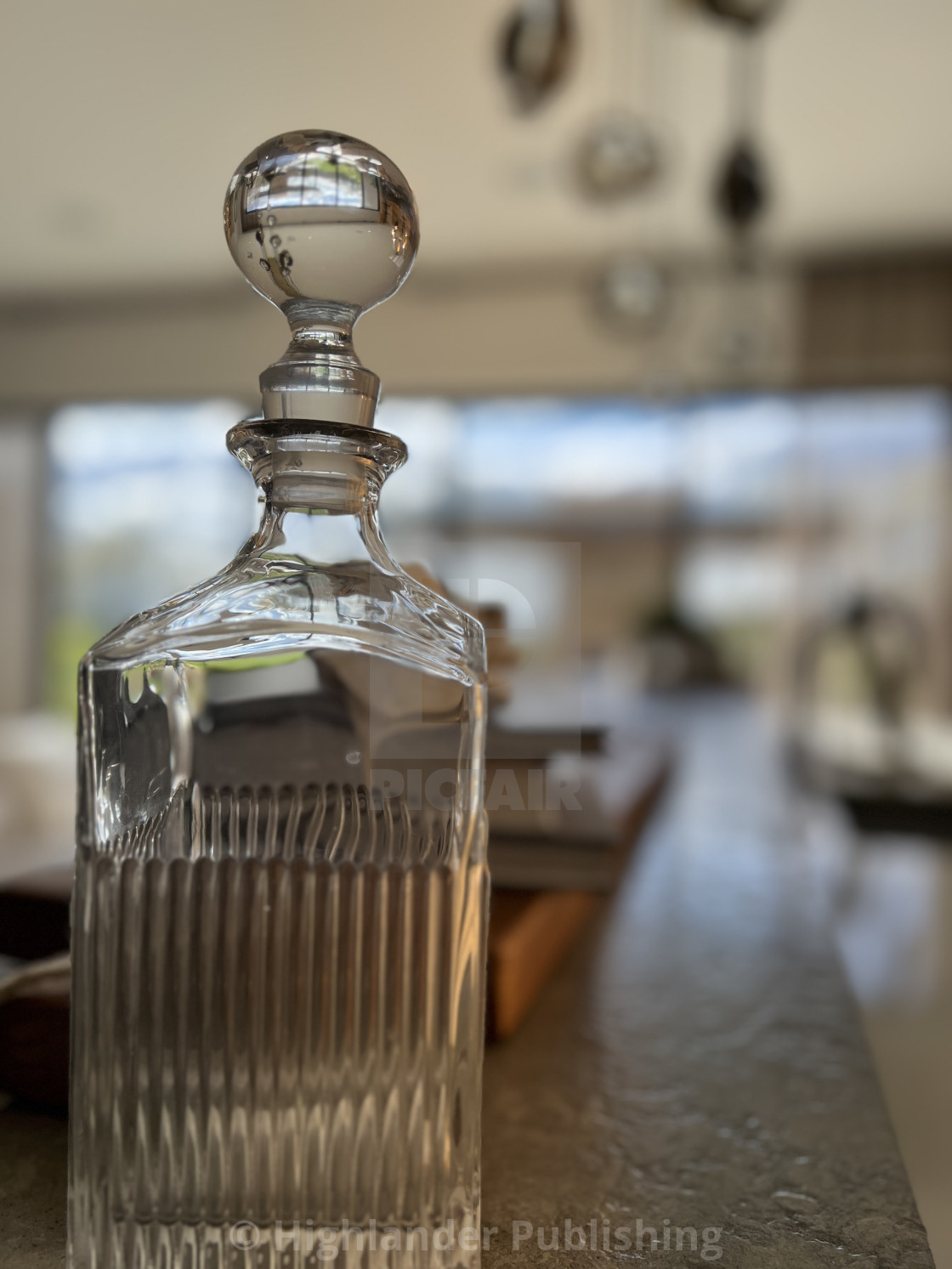 "Crystal decanter on home wet bar" stock image