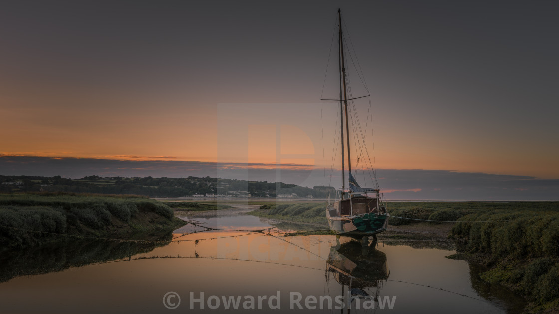 "Red Wharf Bay" stock image