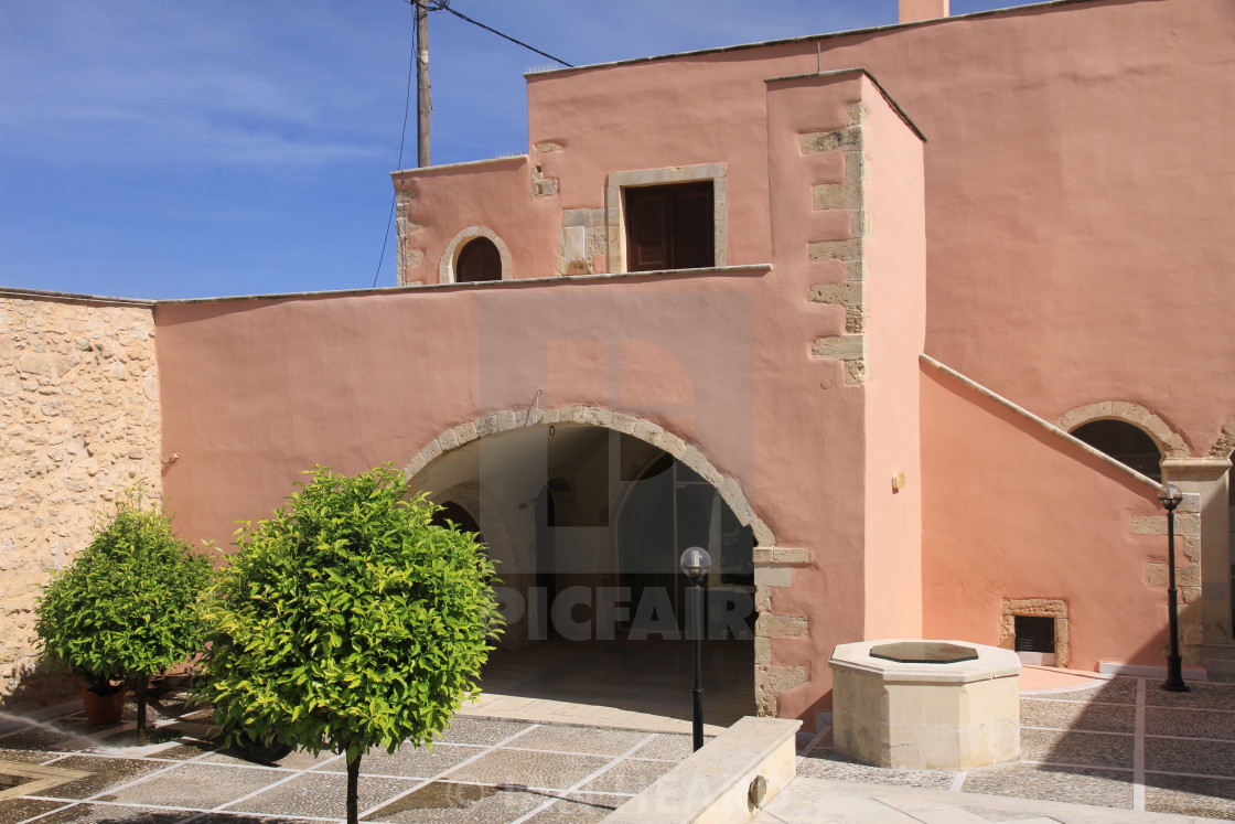 "Sunlit courtyard scene" stock image