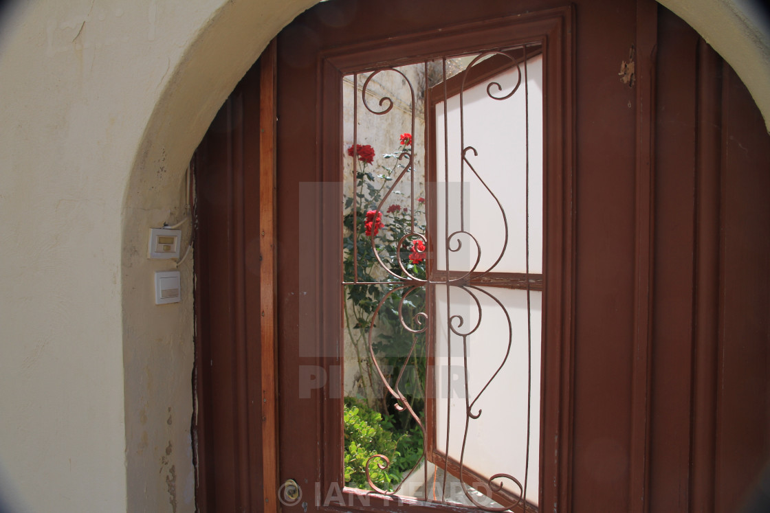 "Window on a garden, Crete" stock image