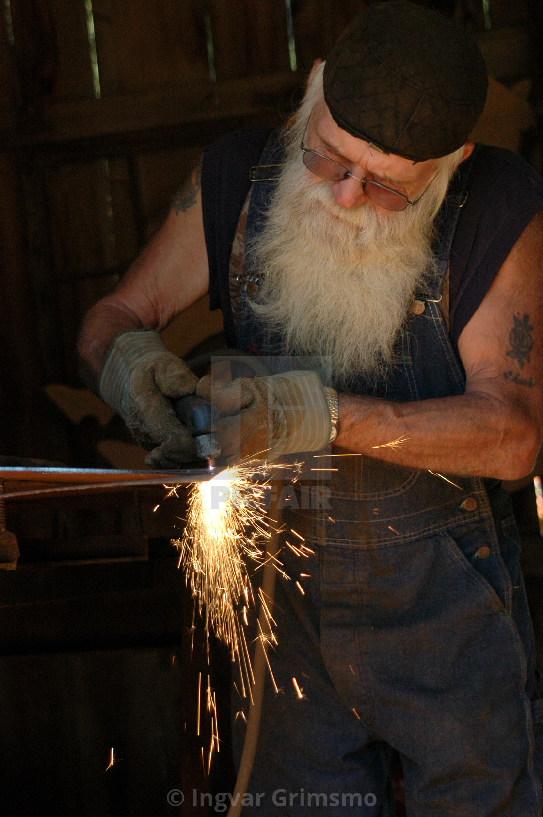 "Welder at a farm show in Lynden, WA" stock image