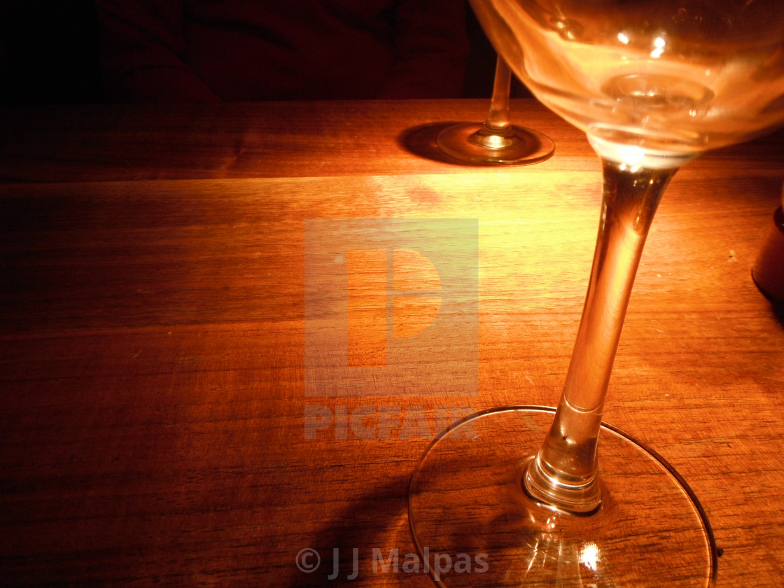 "Well lit wine glass" stock image