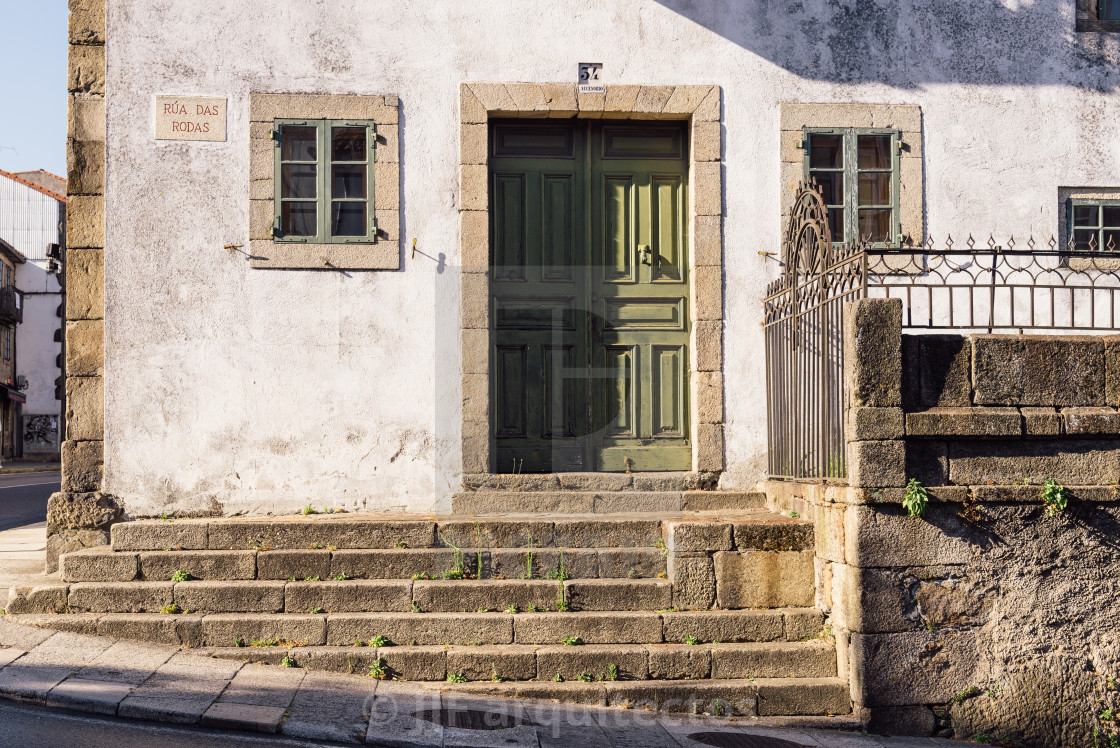 "Old house with green wooden door in Santiago de Compostela" stock image