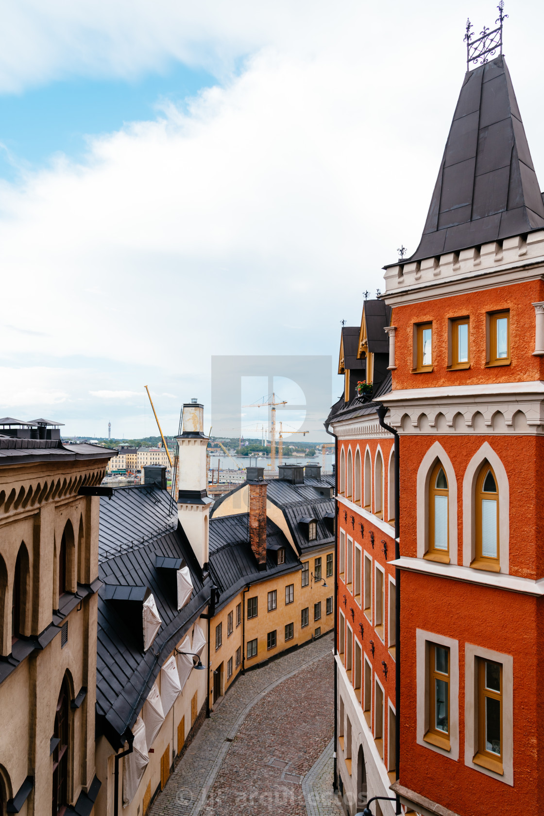 "Picturesque cobblestoned street with colorful houses in Sodermalm in Stockholm" stock image