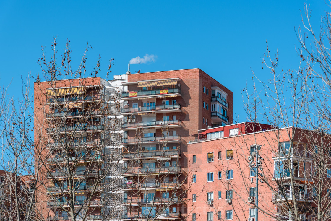 "Apartment Building against blue sky in Madrid" stock image