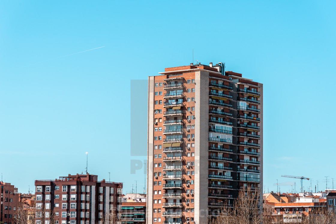 "Apartment Building against blue sky in Madrid" stock image