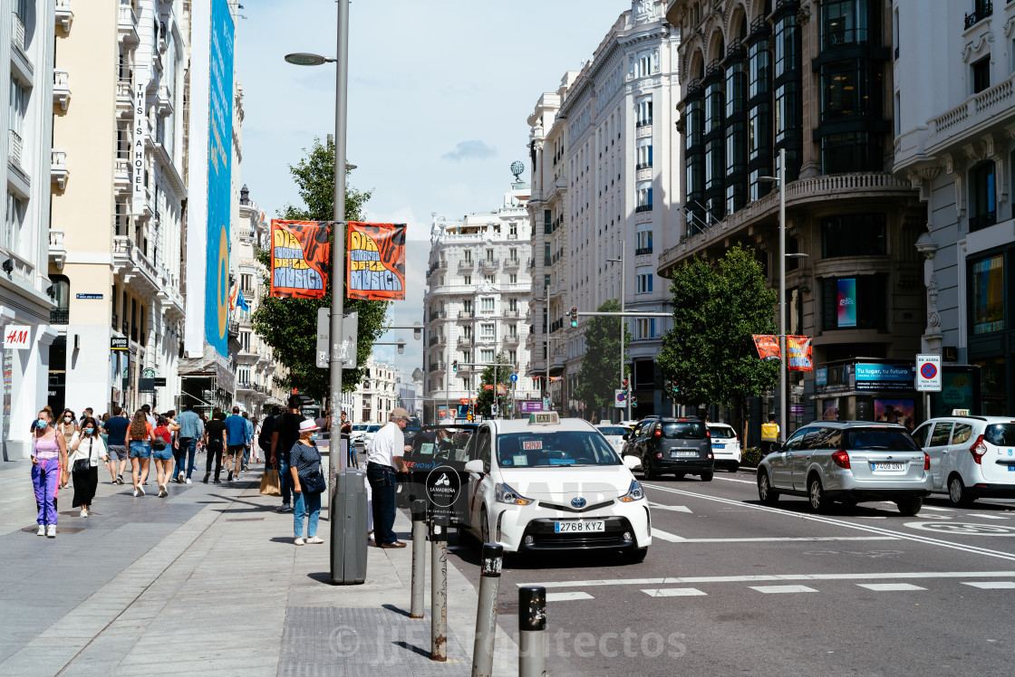 "Busy street scene in Gran Via Avenue in Madrid" stock image