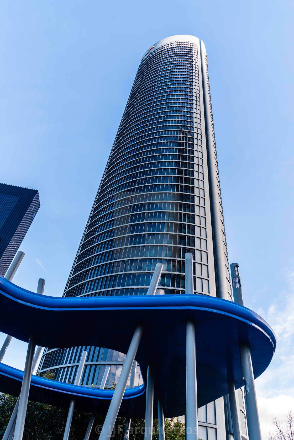 "Low angle view of PWC Tower in Cuatro Torres Business Area in Madrid" stock image