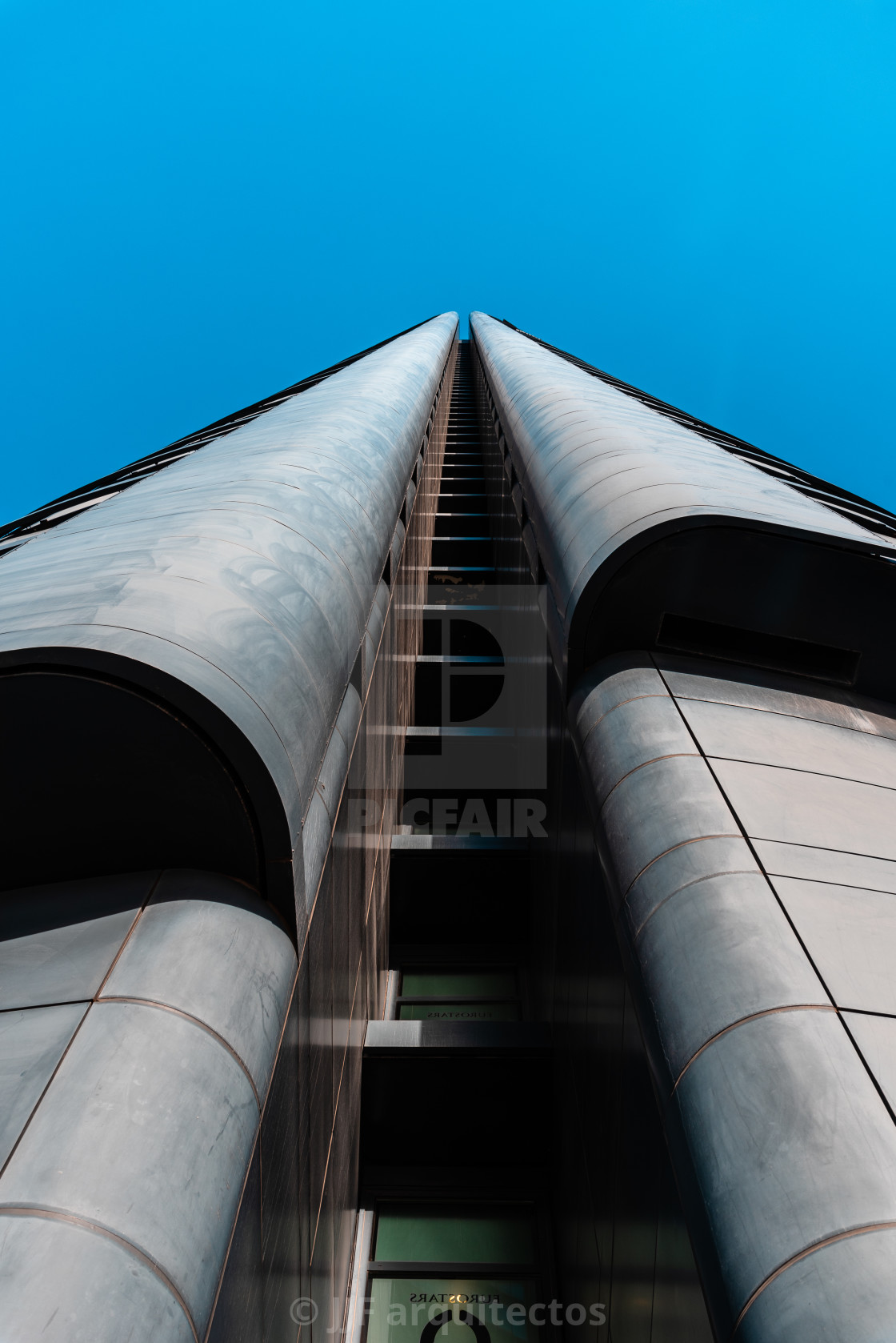 "Low angle view of PWC Tower in Cuatro Torres financial district in Madrid" stock image