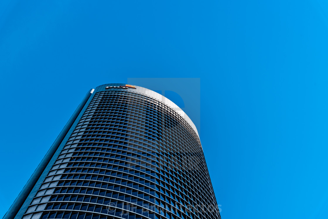 "Low angle view of PWC Tower in Cuatro Torres Business Area in Madrid" stock image