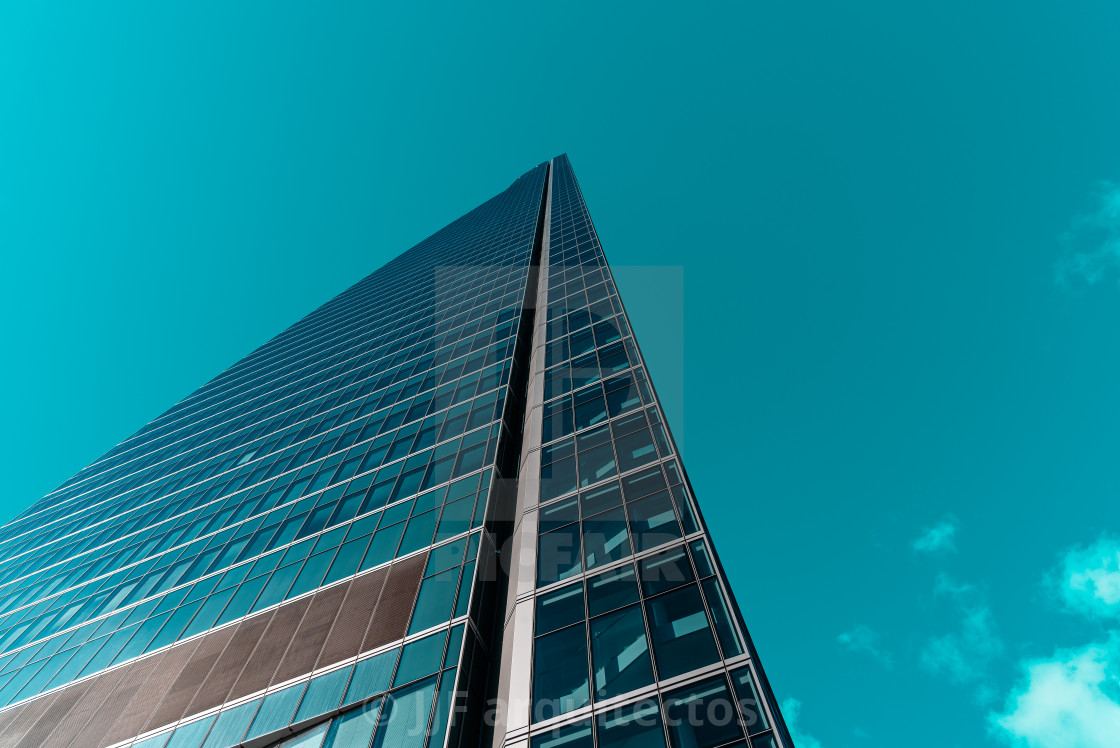 "Low angle view of Espacio Tower in Cuatro Torres Business Area in Madrid" stock image