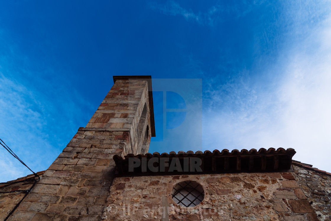 "Bell tower of a medieval stone church in the historic town of Atienza" stock image