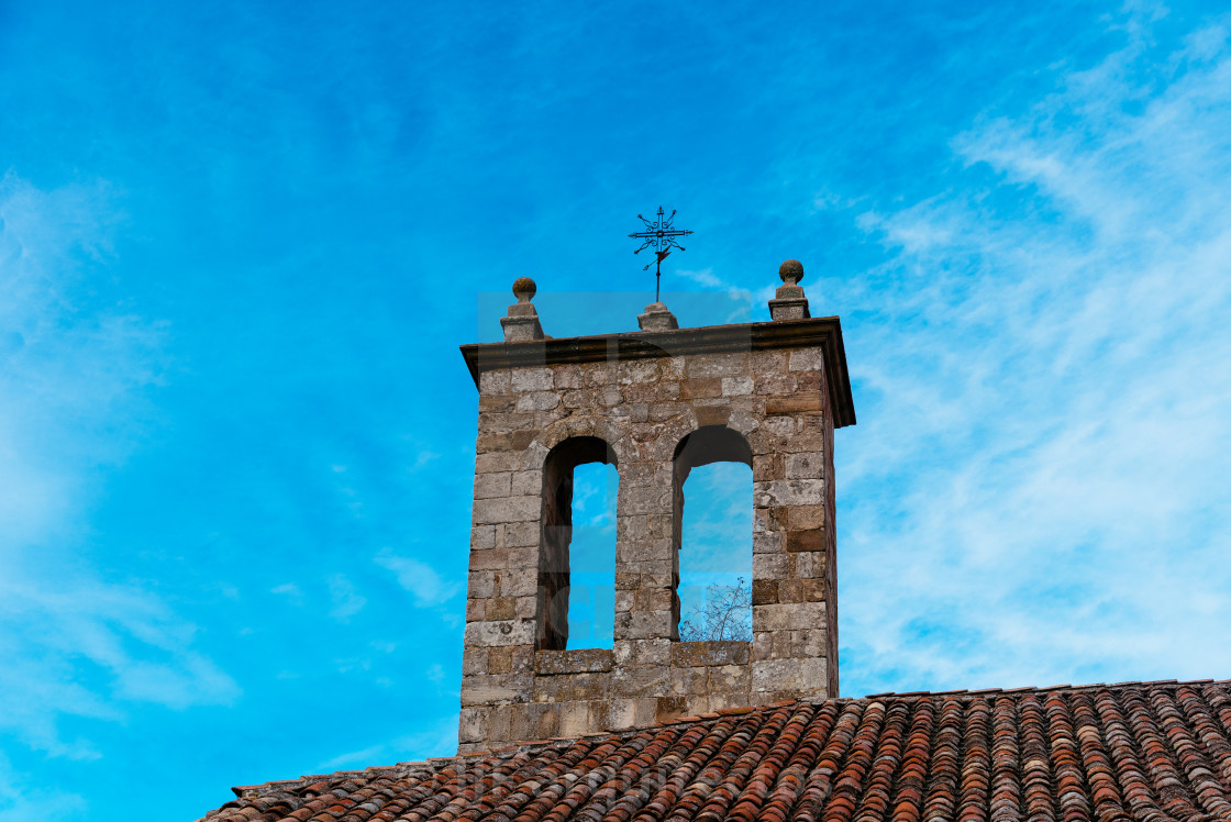 "Bell tower of a medieval stone church in the historic town of Atienza" stock image