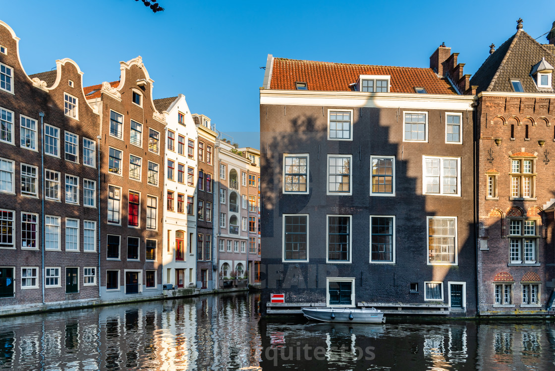 "Old typical Amsterdam houses in Red Light District" stock image