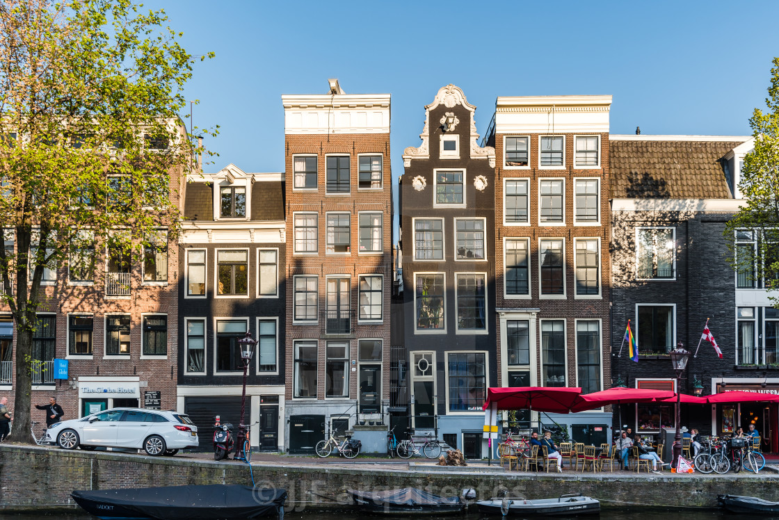 "Old typical Amsterdam houses in Red Light District" stock image