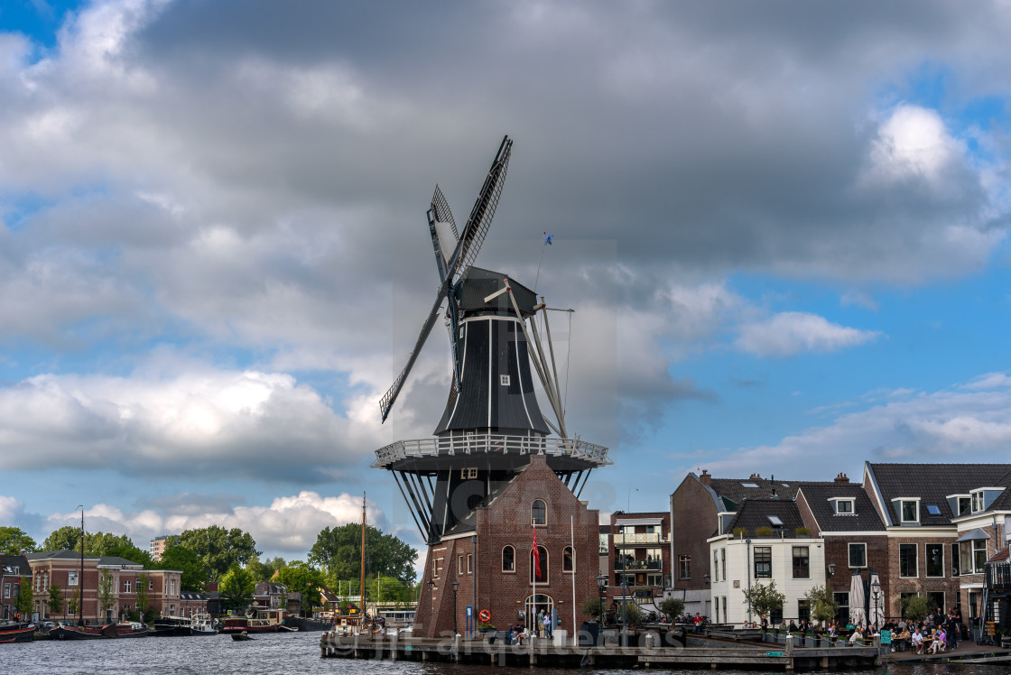 "Famous Windmill De Adriaan by the Spaarne River in Haarlem" stock image