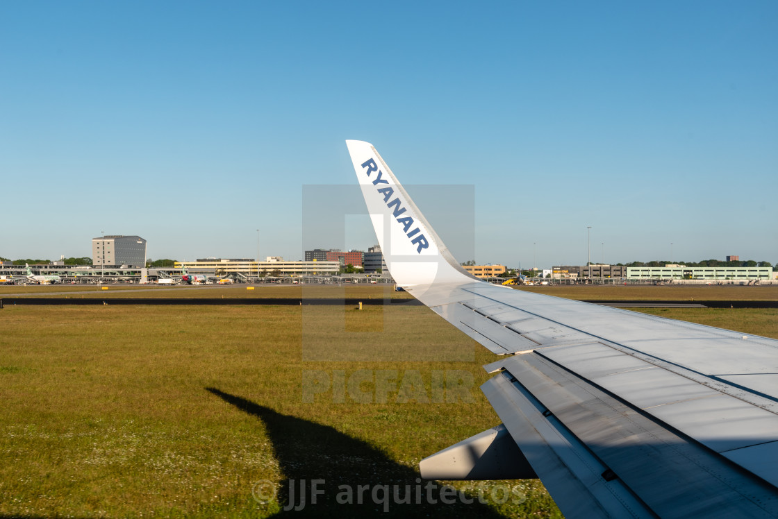 "Ryanair Boeing 737-800 wing in Eindhoven airport, Netherlands" stock image