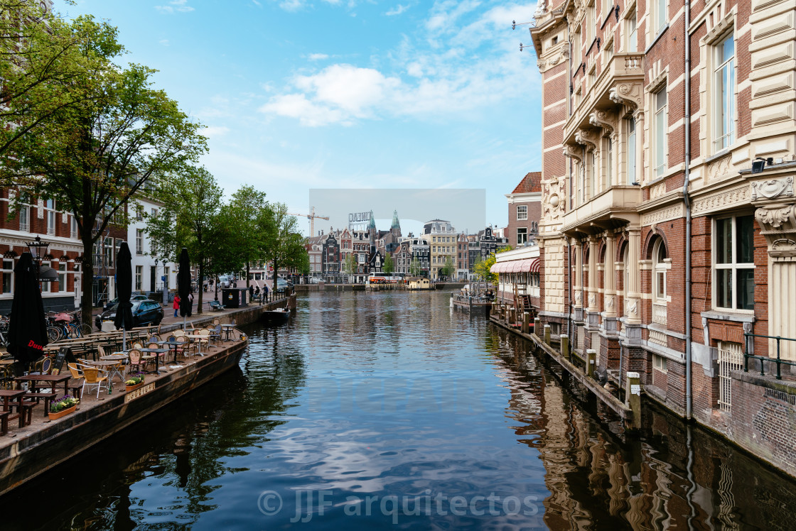 "Scenic view of Kloveniersburgwal canal in central Amsterdam" stock image