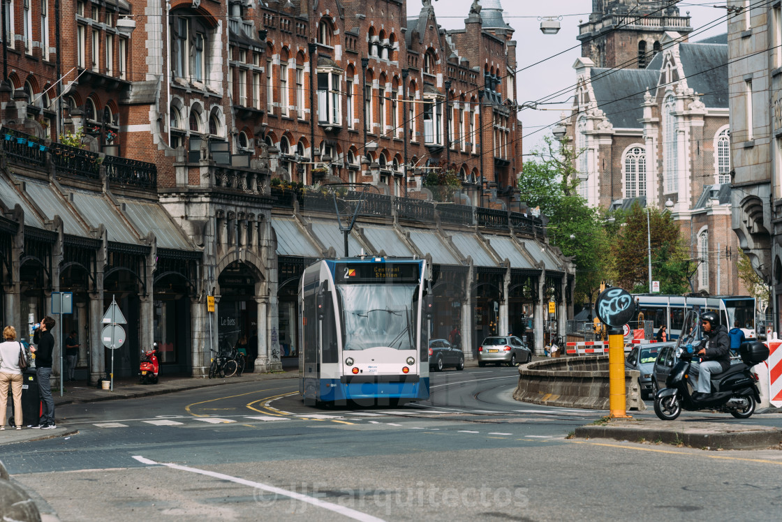 "Tram speeding up Raadhuisstraat street in the historic centre of Amsterdam" stock image