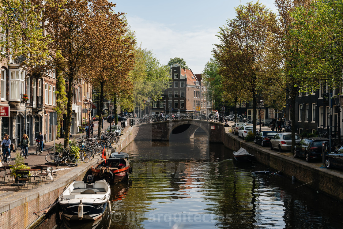 "Scenic view of the waterfront of canal with typical Dutch houses in Amsterdam" stock image