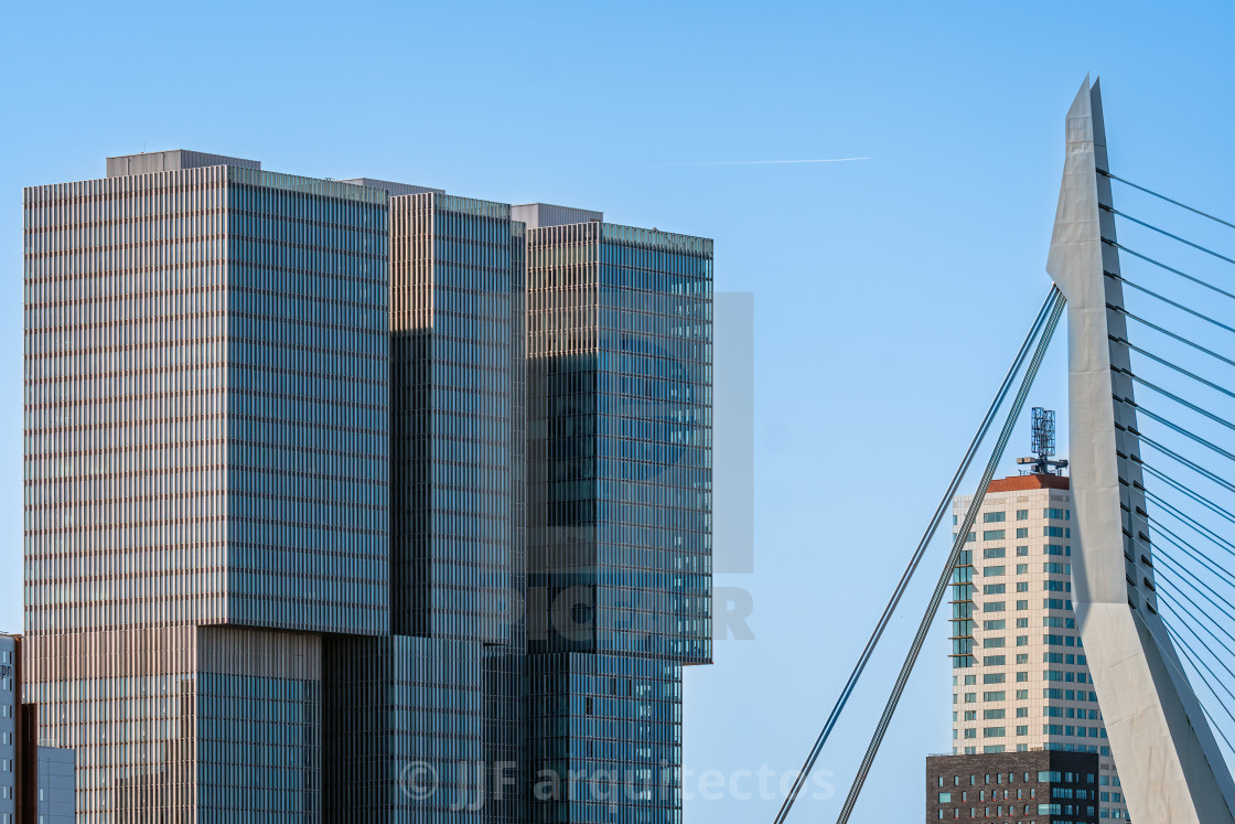 "Iconic skyscraper and bridge against sky in Rotterdam" stock image