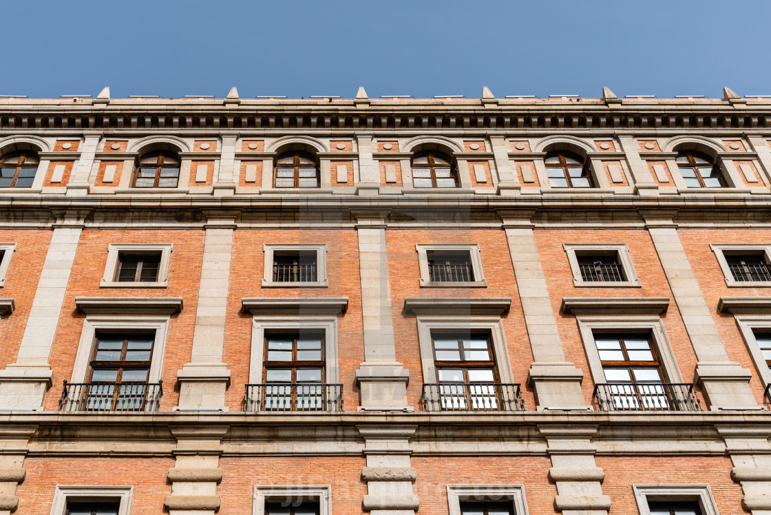 "View of The Alcazar of Toledo, a iconic fortification in the city. Low angle view of the facade" stock image