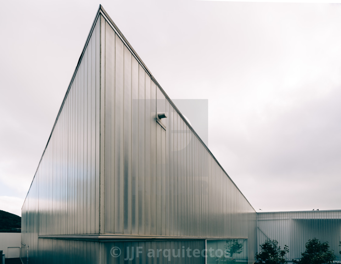 "New building of modern architecture with U-glass facade containing the Luis da Silva Ribeiro in Angra do Heroismo" stock image