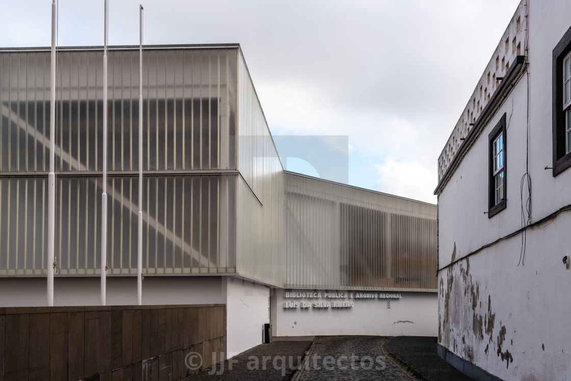 "New building of modern architecture with U-glass facade containing the Luis da Silva Ribeiro in Angra do Heroismo" stock image