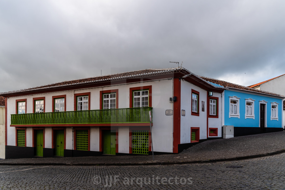 "Traditional colonial houses painted in vibrant colors in the old town of Angra do Heroismo" stock image