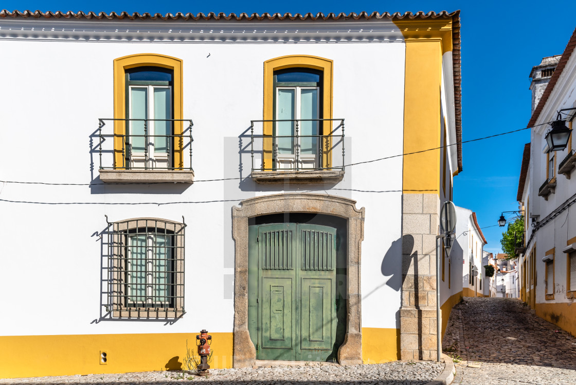 "Cityscape of Evora with typical houses painted in white" stock image