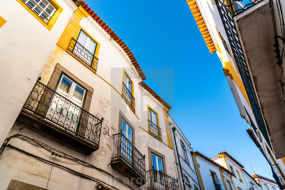 "Cityscape of Evora with typical houses painted in white" stock image