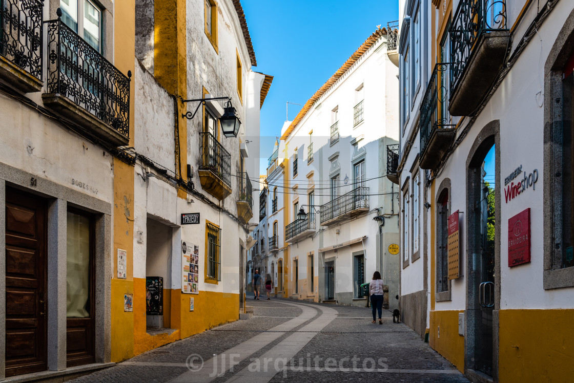 "Pedestrian street in the old town of Evora with typical whitewashed houses with balconies" stock image