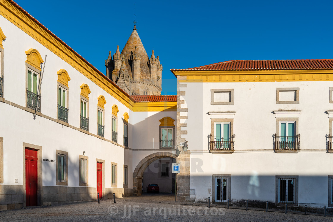 "Pousada hotel convent in the old town of Evora with buildings painted in white and yellow and ceramic tiled roofs" stock image