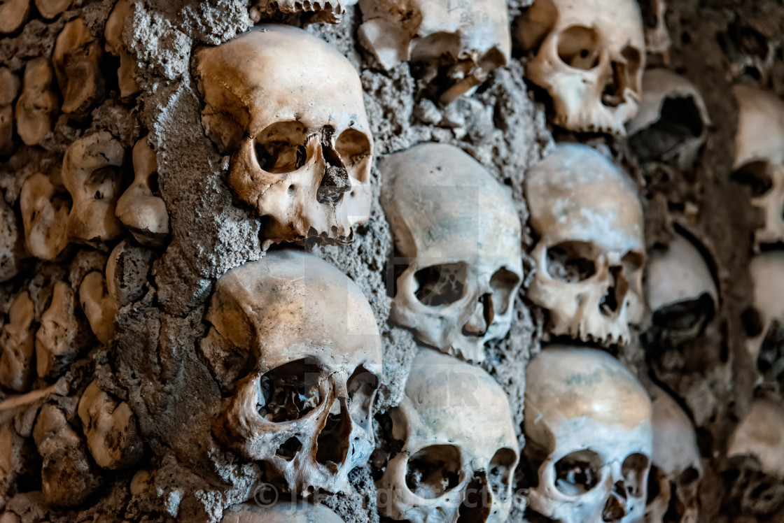 "Skulls on the wall of Capela dos Ossos or Chapel of Bones in Evora" stock image