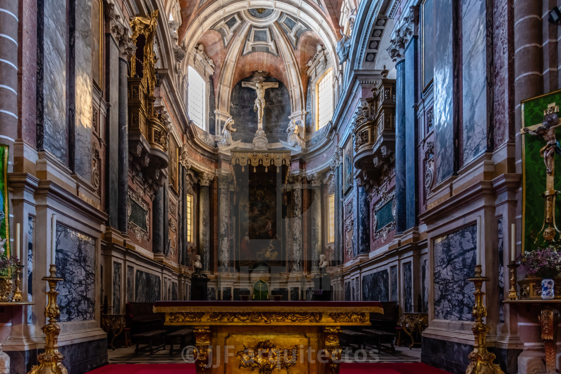 "Cathedral of Evora. Low angle view against blue sky of main facade" stock image