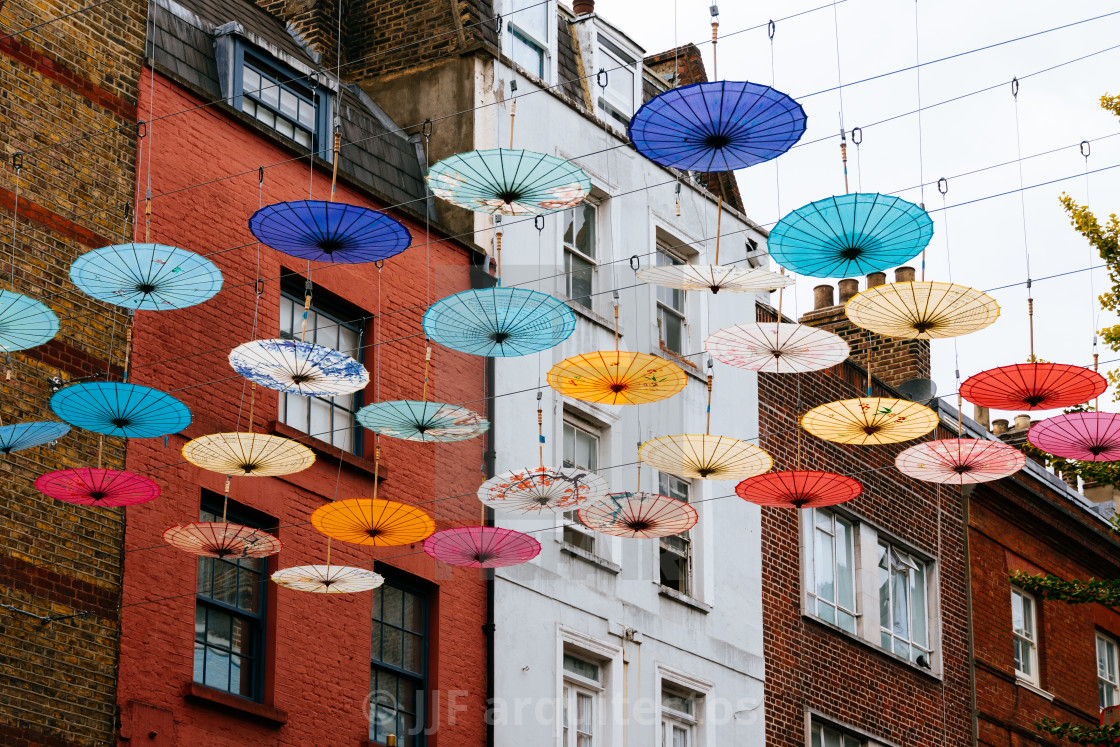 "Umbrellas hanging over street in Chinatown in London" stock image