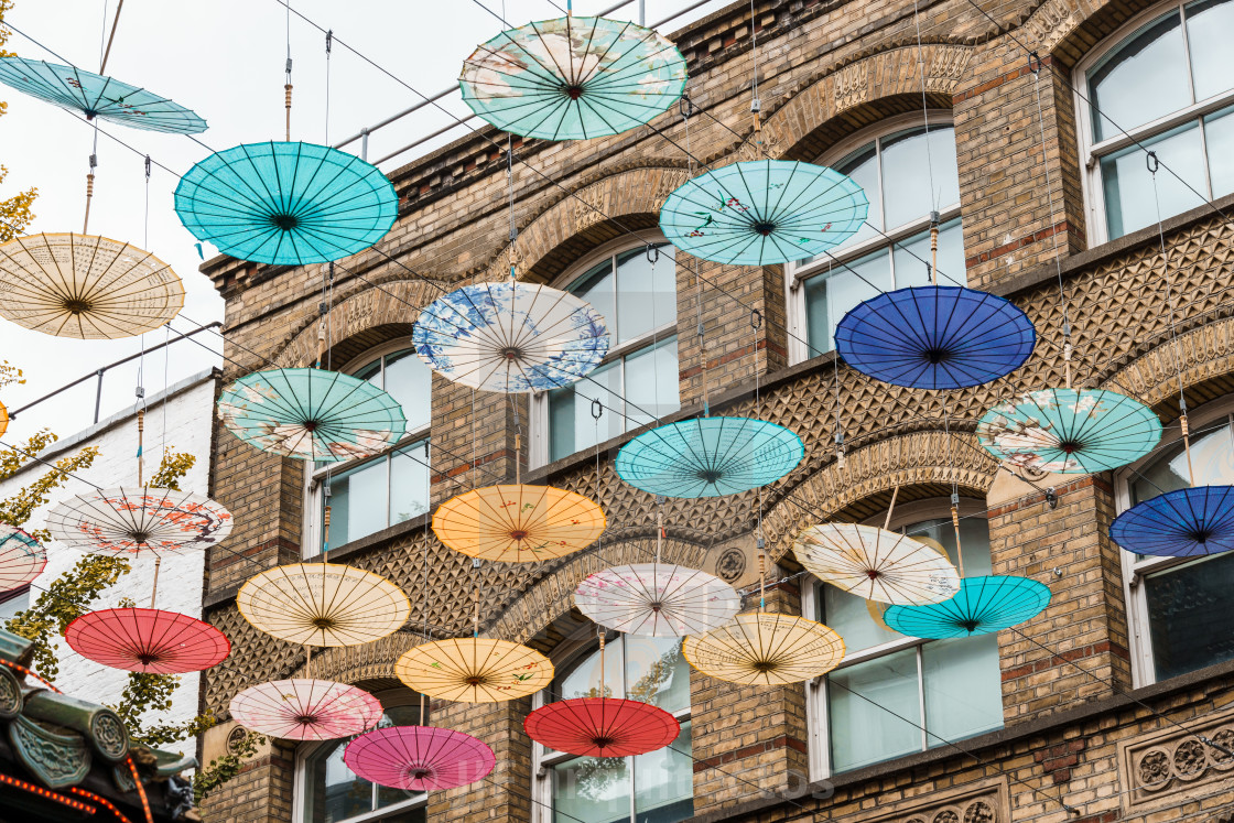"Umbrellas hanging over street in Chinatown in London" stock image