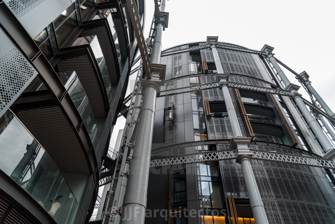 "Low angle view of Gasholders, a modern luxury apartment building in London" stock image