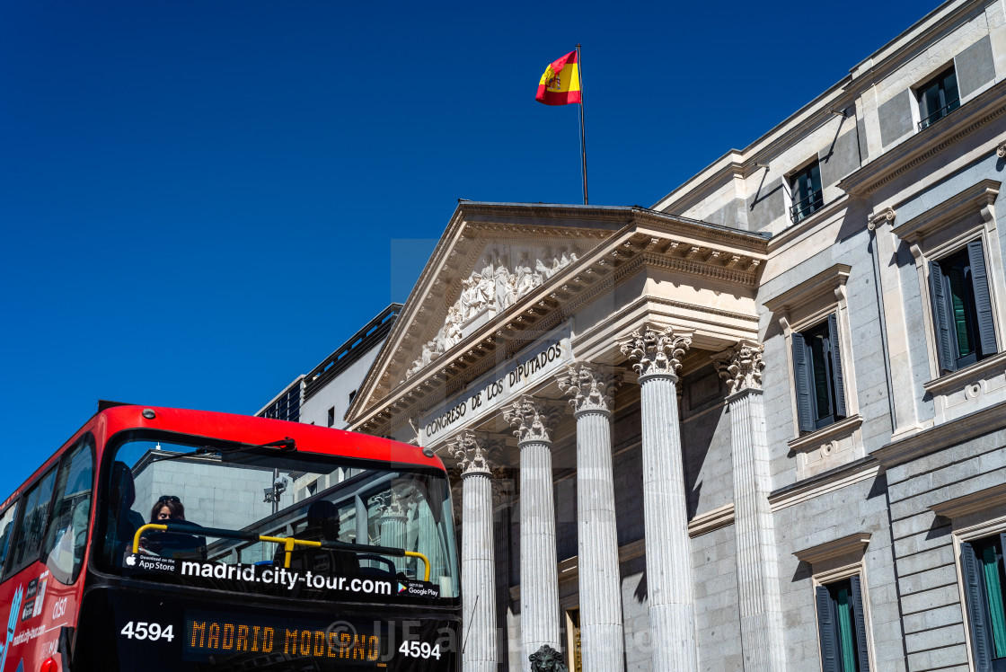 "Hop on hop off Madrid City Bus by the Congress of Deputies in Madrid" stock image