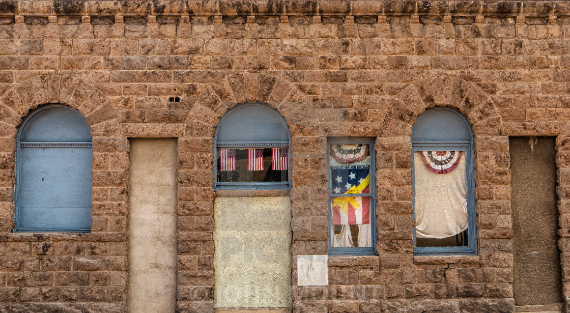 "Patriotic Wall in Arizona" by JOHN MOUNT - £20.00 "Patriotic Wall in Arizona" stock image