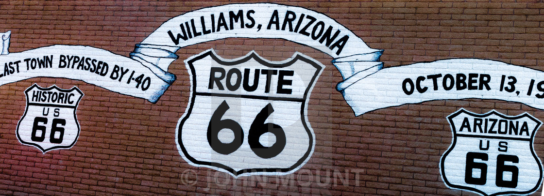 "Route 66 sign painted on brick wall" by JOHN MOUNT - £20.00 "Route 66 sign painted on brick wall" stock image
