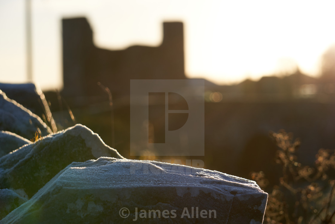 "Frost on a stone wall" stock image