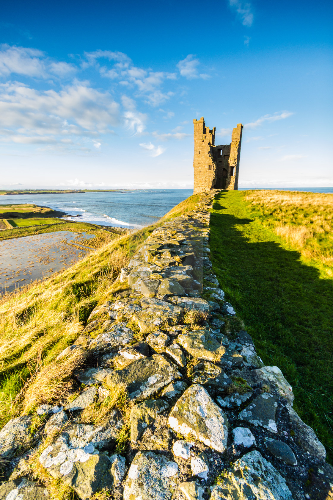 "Dunstanburgh Castle." stock image