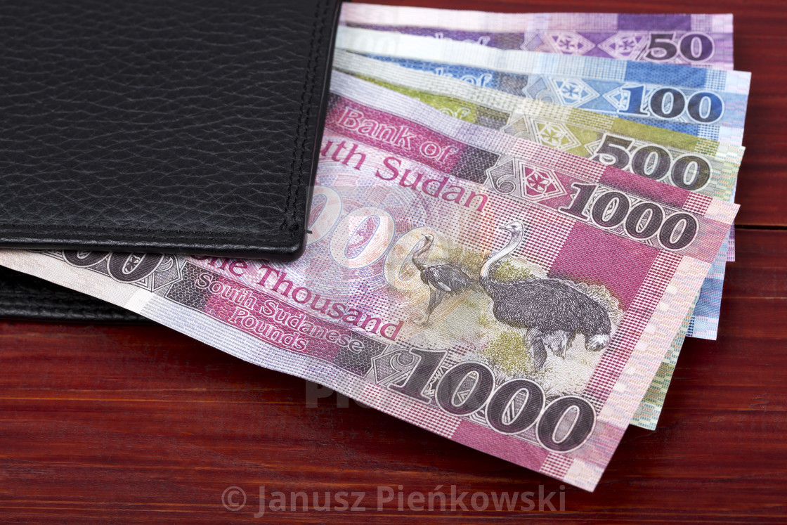 "South Sudanese money in the black wallet" stock image