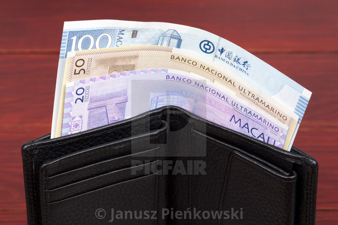 "Macanese money - pataca in the black wallet" stock image